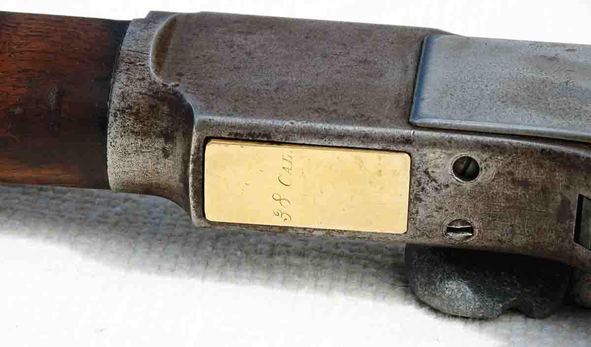 Once the .38 WCF/.38-40 was added to caliber options in 1879, Winchester began inscribing the caliber on the bottom of brass cartridge lifters.